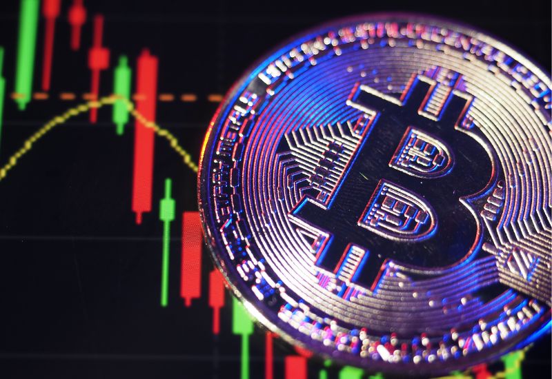 Purple Bitcoin above Cryto Trading Graphic